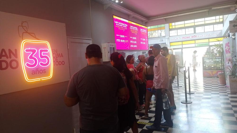 turistas teleférico